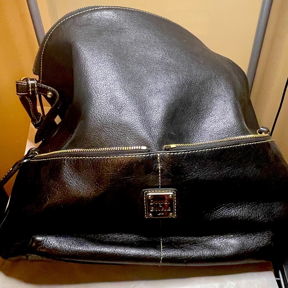 Dooney & Bourke Hobo large black leather shoulder bag.